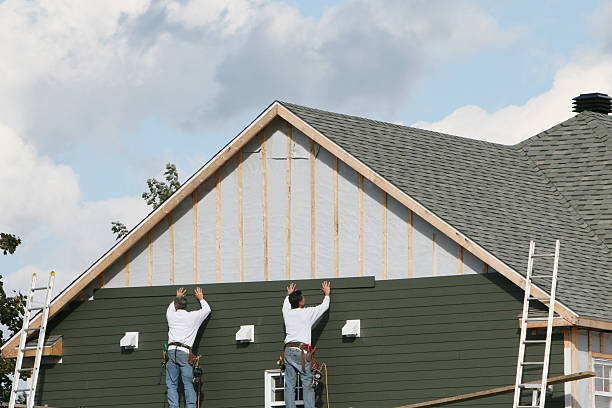 Professional Vinyl Siding technician working in Stoneham, MA
